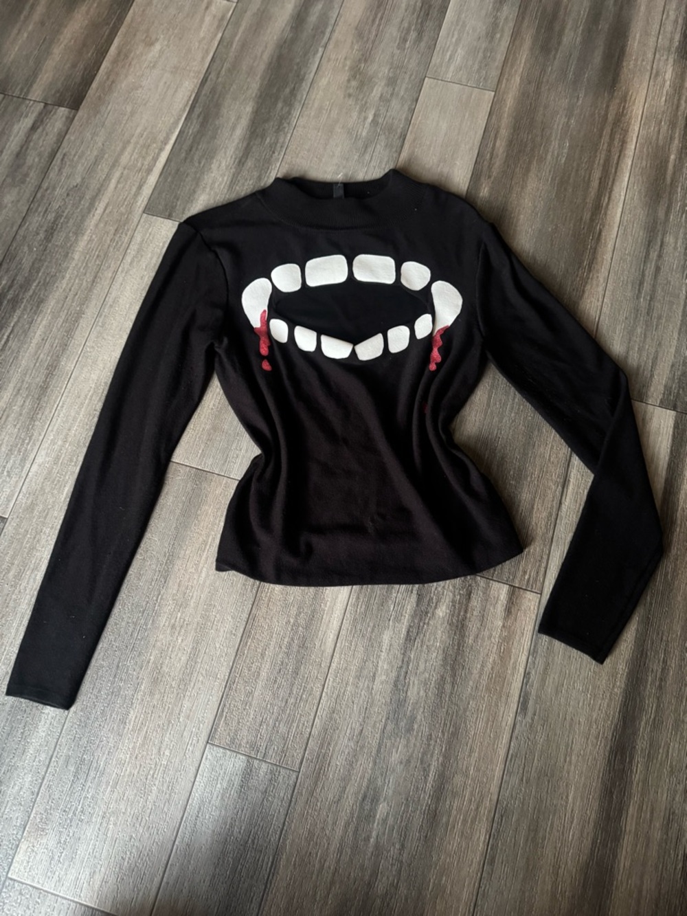 H&M: Vampire Fangs Cutout Sweater Top